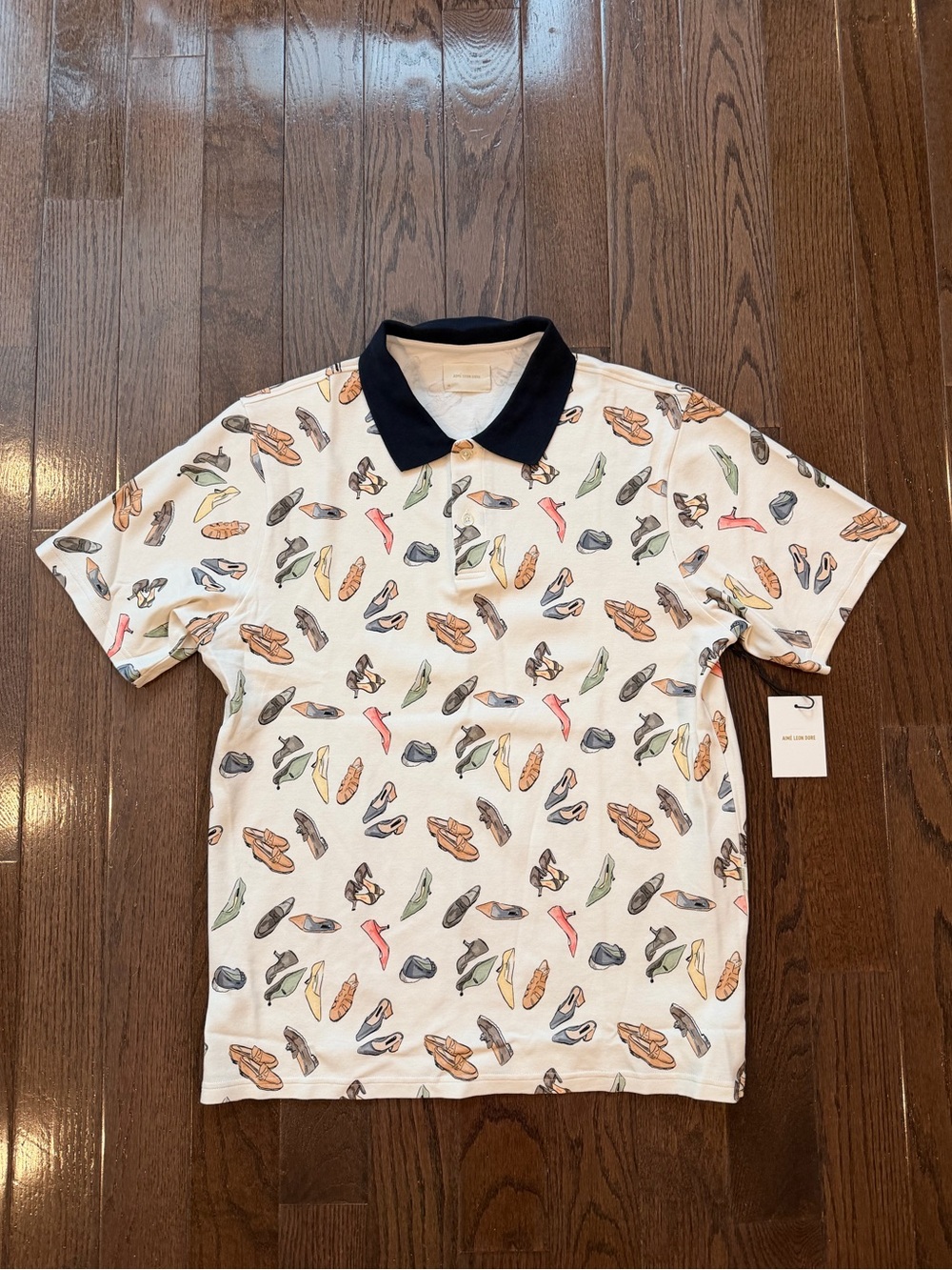 Aime Leon Dore White Polo with Multicolor Shoe Print and Black Collar